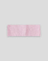 frontansicht eines haarbands in pink aus merinowolle