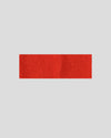 frontalansicht eines haarbands aus merinowolle in der farbe rot/orange