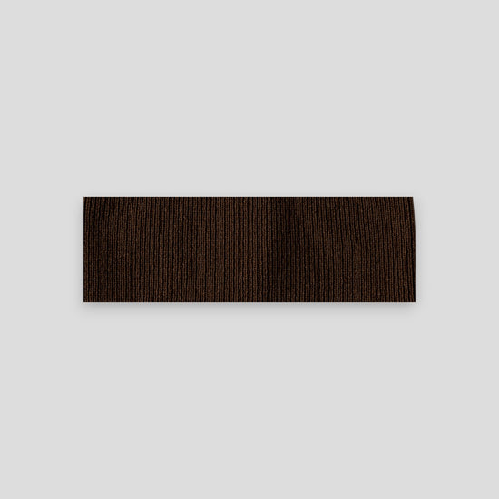 frontalansicht eines haarbands aus merinowolle in der farbe braun
