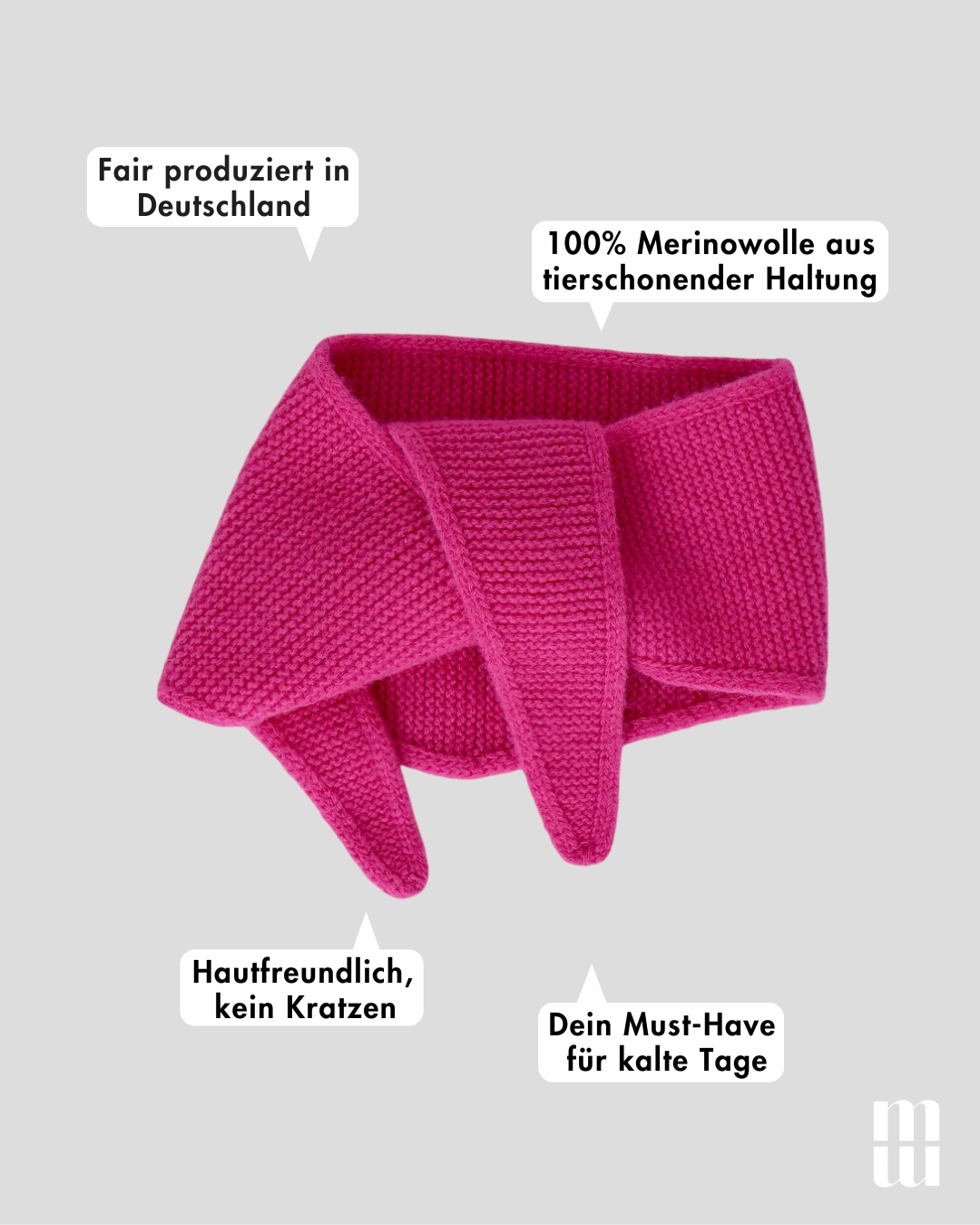 frontansicht eines minischals aus merinowolle in pink inklusive produktvorteilen
