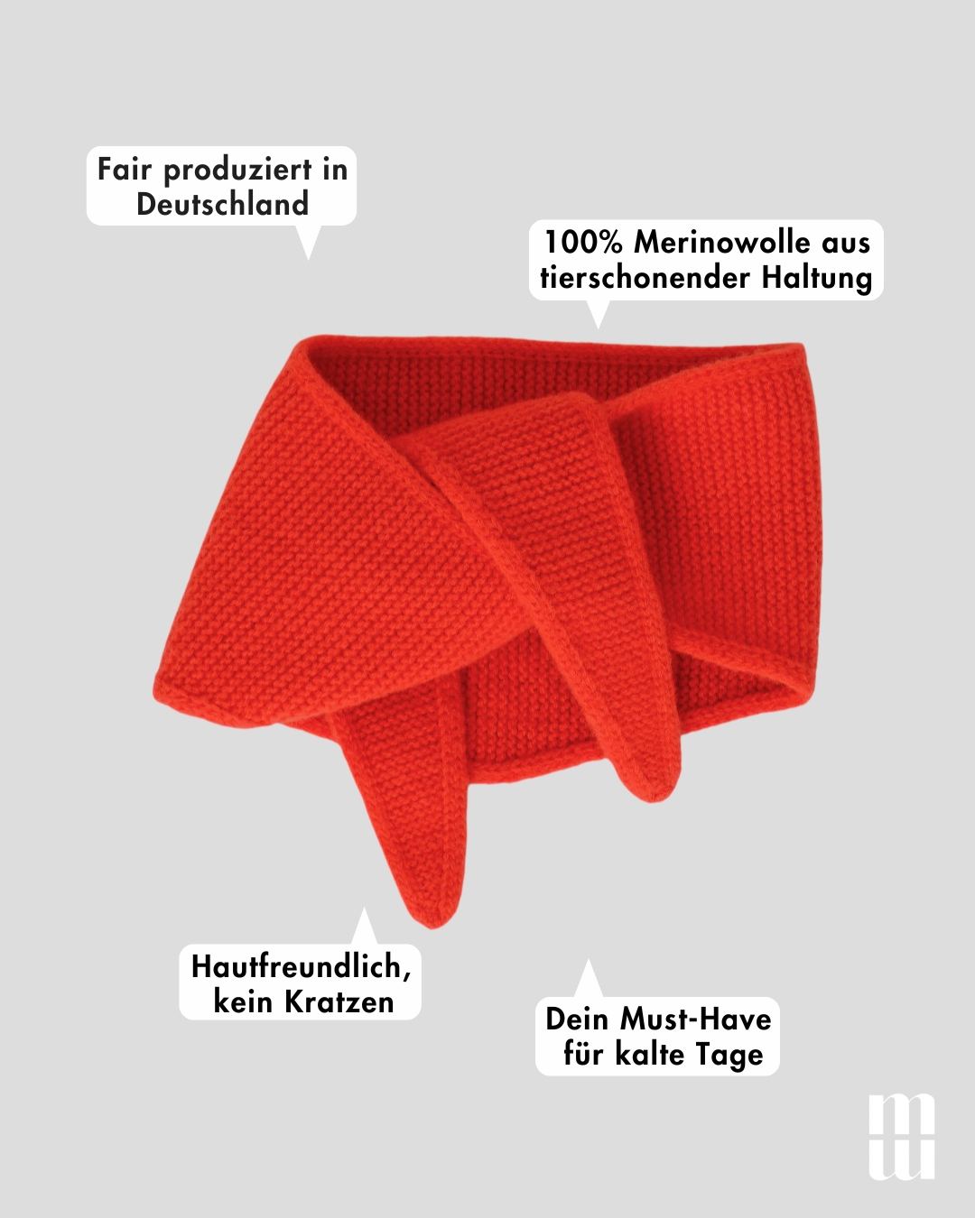frontansicht eines minischals aus merinowolle in rot orange inklusive produktvorteilen