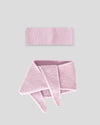 frontalansicht eines haarbands und mini schals aus merinowolle in der farbe pink