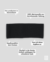 frontansicht eines haarbands aus merinowolle in schwarz inklusive produktvorteilen